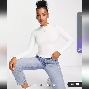 White lettuce hem mock neck